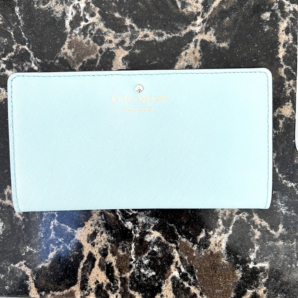 Kate Spade New York Light Blue Slim Fold Snap “Staci” Wallet.
